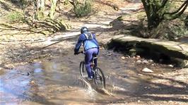Ashley confidently rides the ford below Cross Furzes